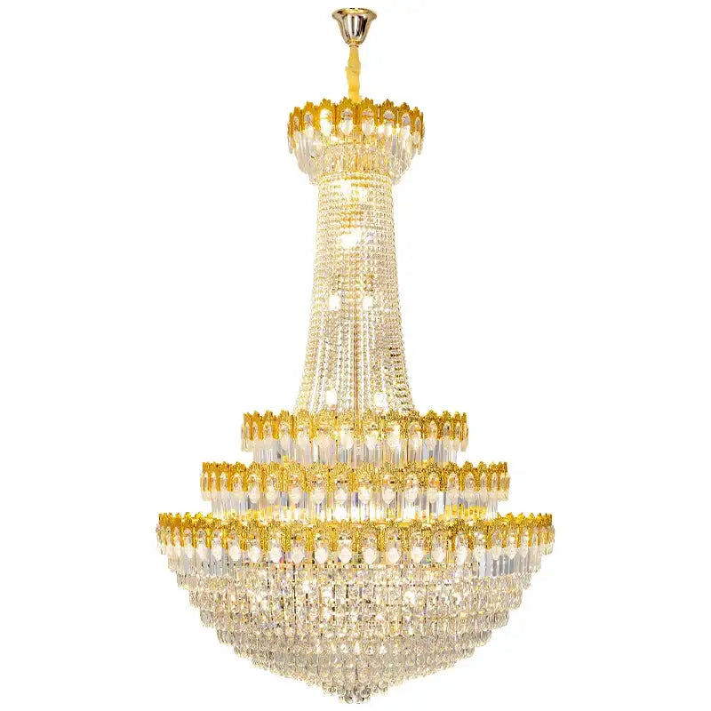 A multi-tiered decorbites crystal chandelier with gold-toned metal and cascading clear crystals for luxury living rooms