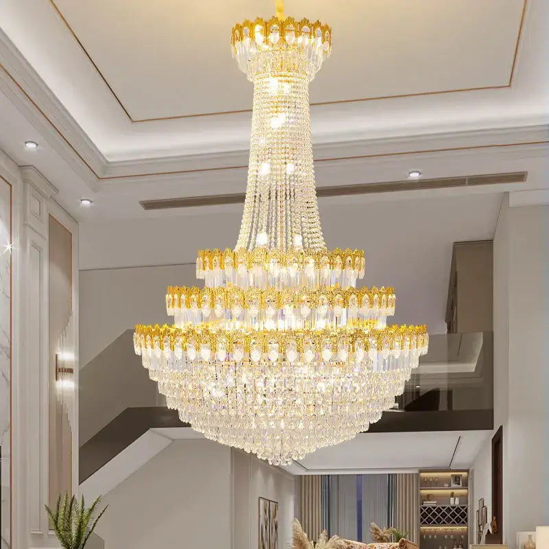 DecorBites crystal chandelier with gold-toned metal accents and cascading clear crystals for luxury living rooms