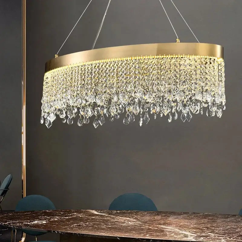 A decorbites crystal chandelier with luxury gold tone and cascading clear crystal droplets for elegant ceiling lighting