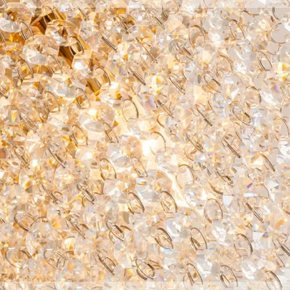 Golden decorbites crystal chandelier with faceted clear crystal beads refracting light for living room or bedroom ceiling light
