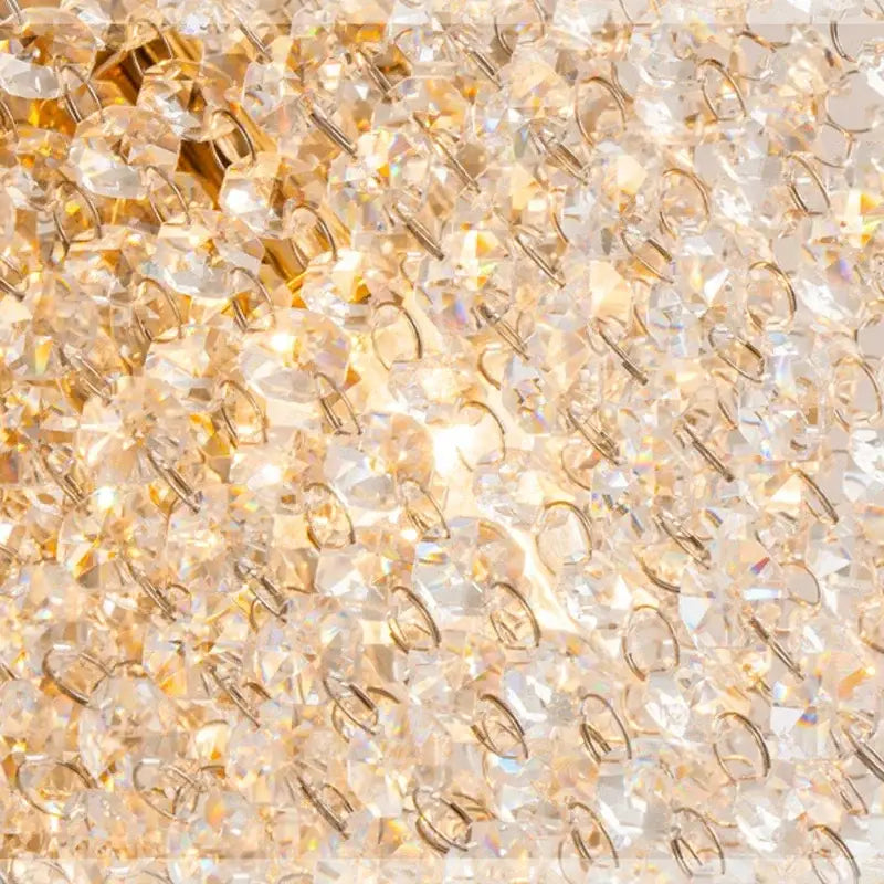 Golden decorbites crystal chandelier with faceted clear crystal beads refracting light for living room or bedroom ceiling light