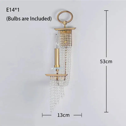 Gold-toned wall sconce with cascading clear crystal beads and candle-style bulb holder in decorbites crystal chandelier