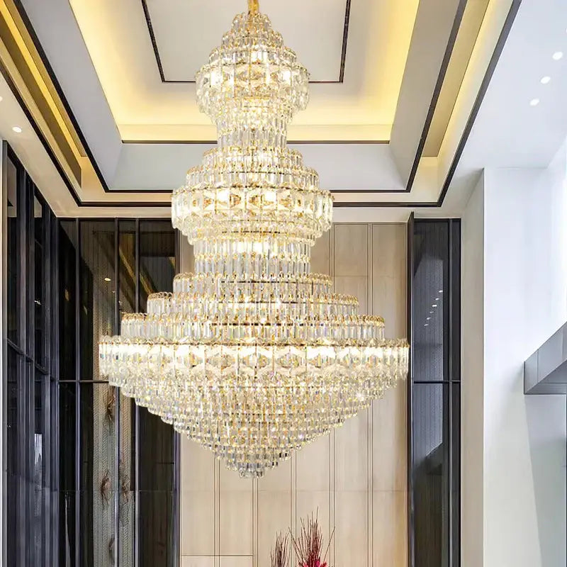 DecorBites crystal chandelier featuring multi-tiered faceted crystals with gold accents for luxury living room lighting