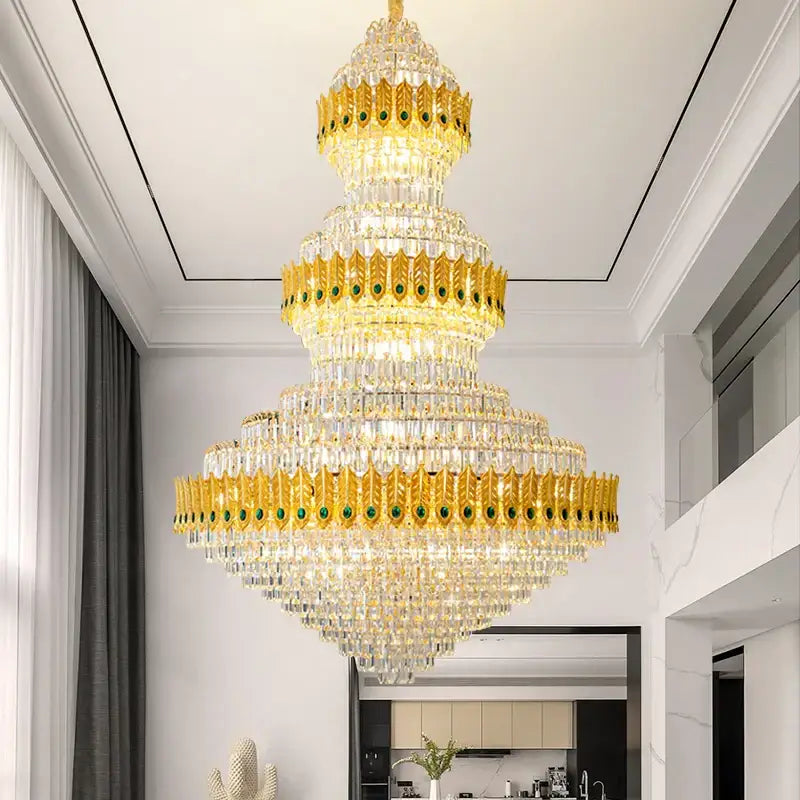 A decorbites crystal chandelier with golden ornate frames, clear crystal prisms, and green gemstone accents for luxury living rooms