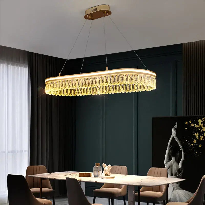 Gold-toned decorbites crystal chandelier with geometric design and cascading crystals for luxury LED lighting