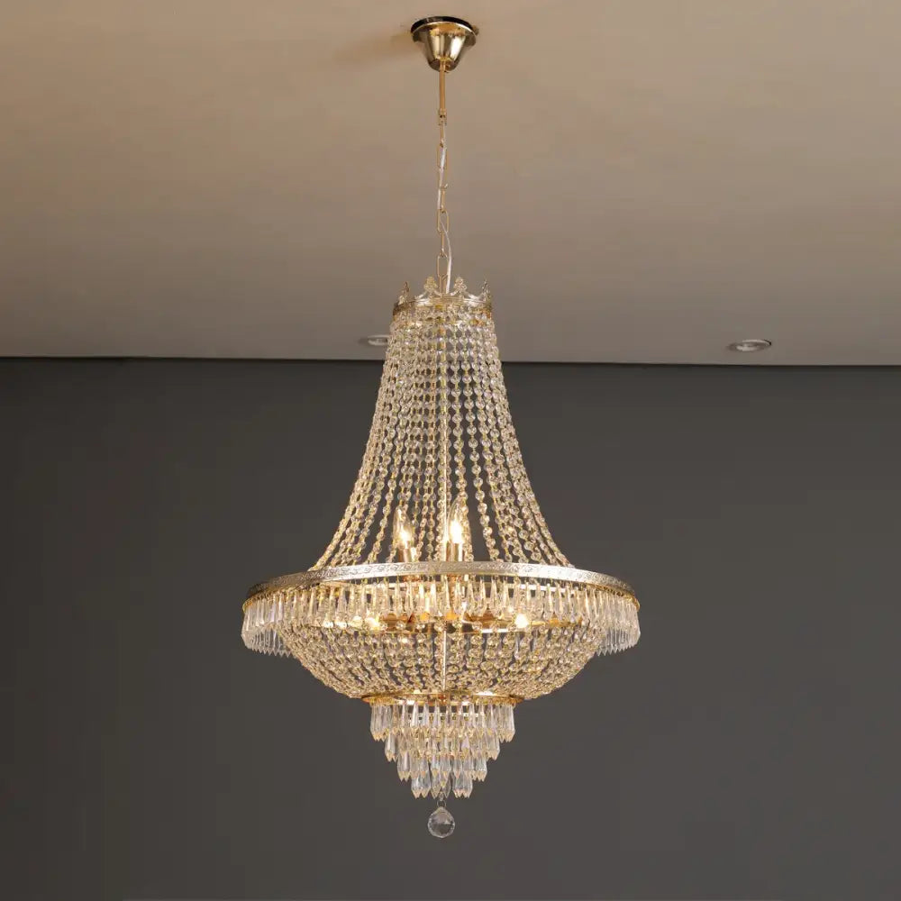 DecorBites crystal chandelier with gold-toned metal frame and cascading clear crystals for luxury living spaces