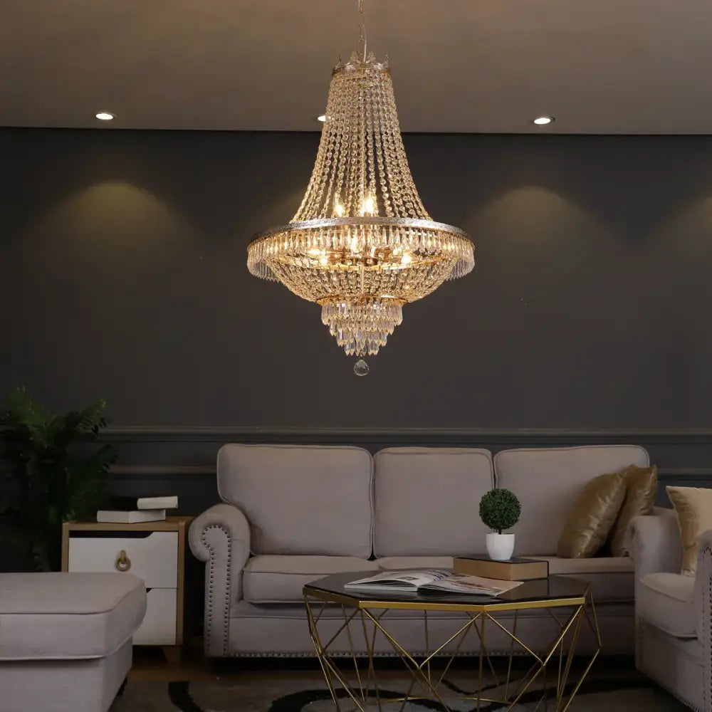 A luxurious DecorBites crystal chandelier with gold-toned frame and clear faceted crystals for elegant interiors