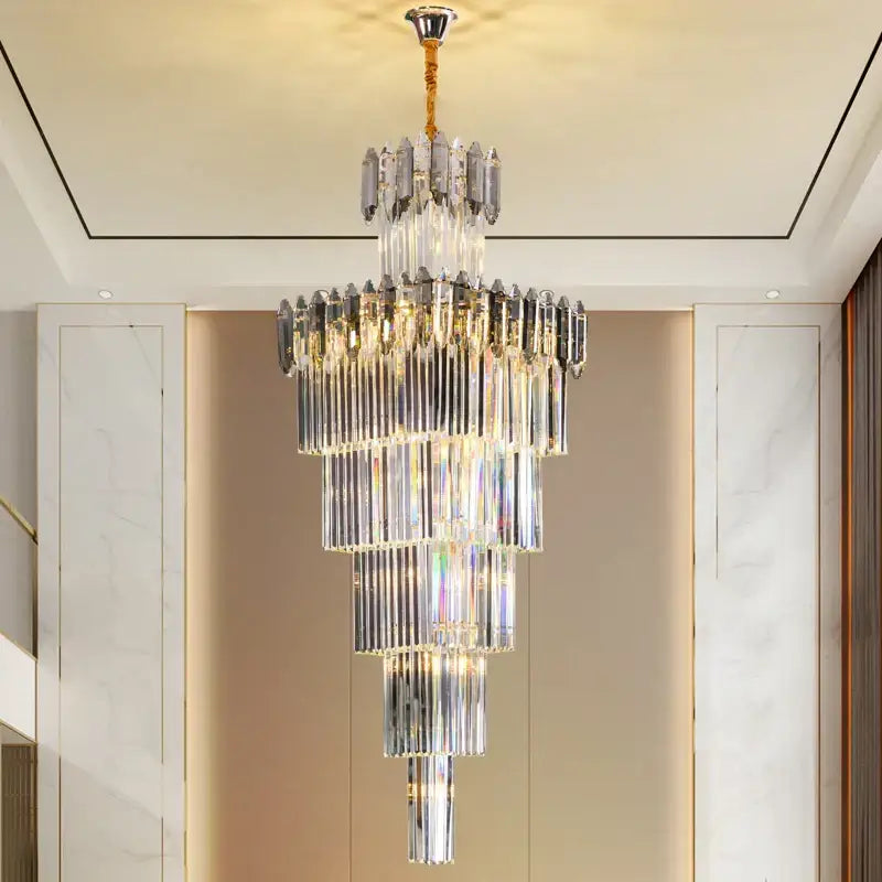 Decorbites crystal chandelier with multi-tiered cascading clear and frosted glass rods and gold-toned chain suspension