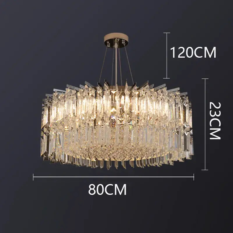 Decorbites crystal chandelier with cascading clear glass prisms and polished brass finish for luxury living room