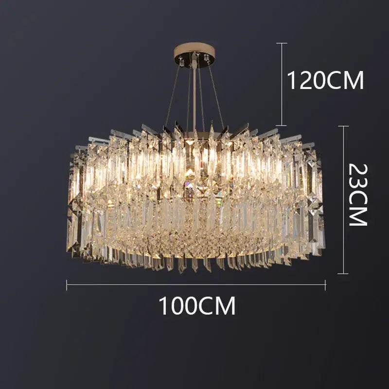 A decorbites crystal chandelier with cascading clear glass prisms and polished brass mount for luxury living spaces