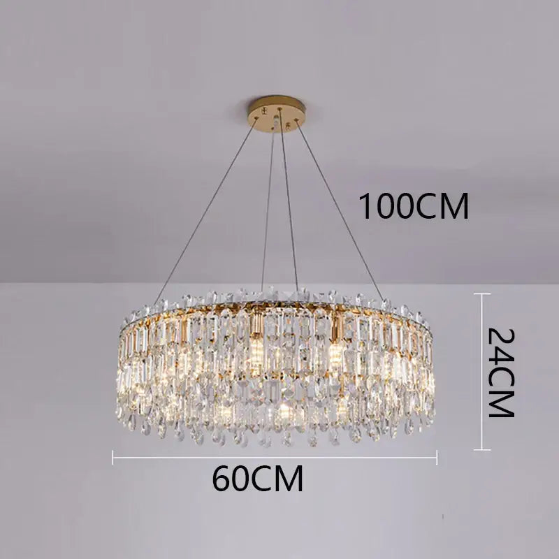 Gold-toned decorbites crystal chandelier with multi-tier clear crystal prisms and teardrop accents for luxury living rooms