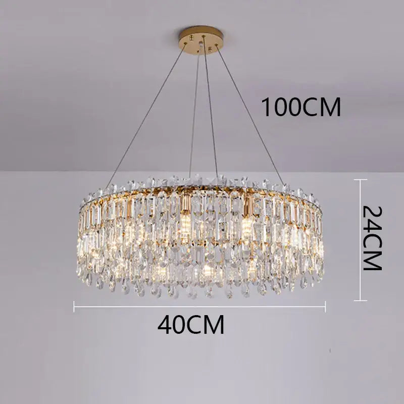 A luxurious gold-toned DecorBites crystal chandelier with faceted crystals and teardrop pendants for elegant living spaces