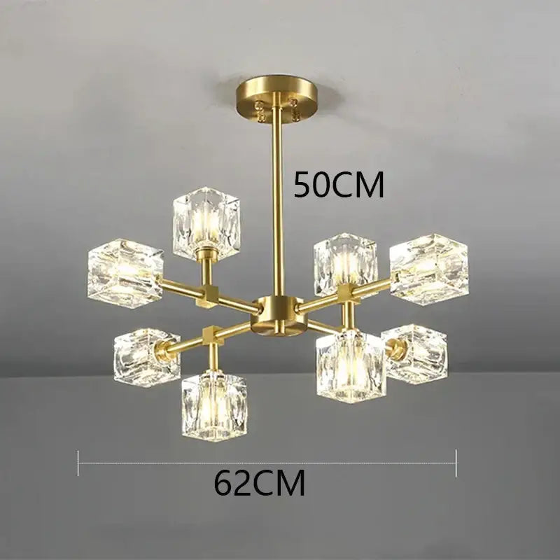 Gold-toned decorbites crystal chandelier with eight clear crystal cubes for luxury living room and bedroom lighting