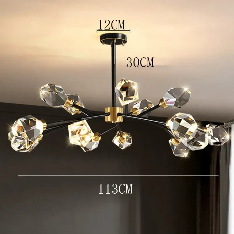 Modern decorbites crystal chandelier with black and gold accents featuring faceted clear glass orbs for luxury living room lighting