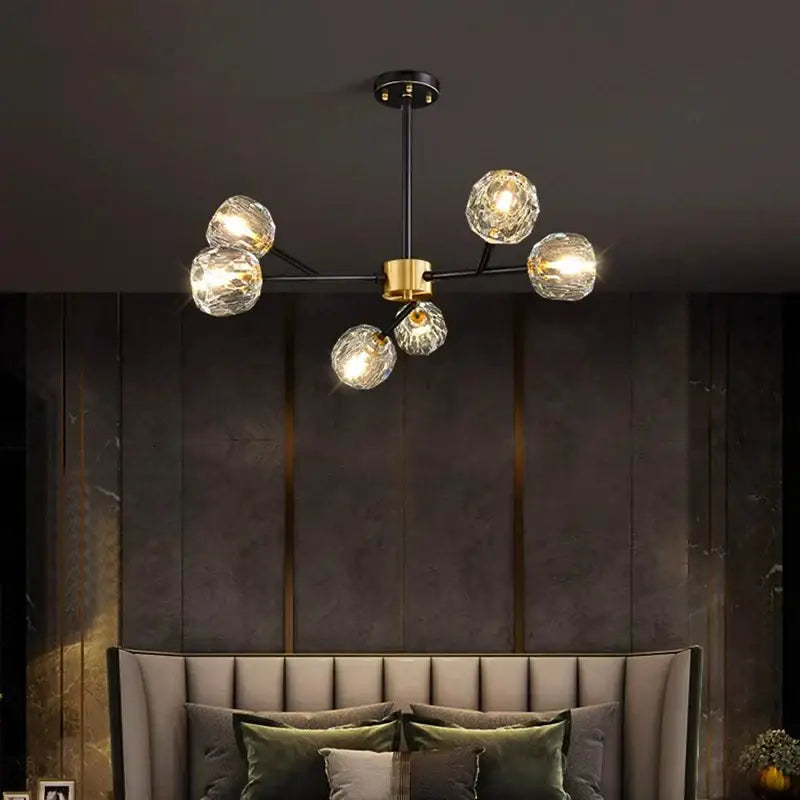 Modern decorbites crystal chandelier with five clear glass globe bulbs on black metal frame for living and dining rooms