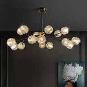 DecorBites crystal chandelier with clear faceted glass globe bulbs on black metal frame for living and dining rooms