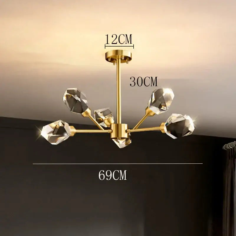 Gold-toned decorbites crystal chandelier with five faceted crystal shades for luxury living room and dining ceiling light