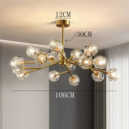 Gold-toned decorbites crystal chandelier with multiple crystal globe shades for luxury living and dining rooms ceiling light
