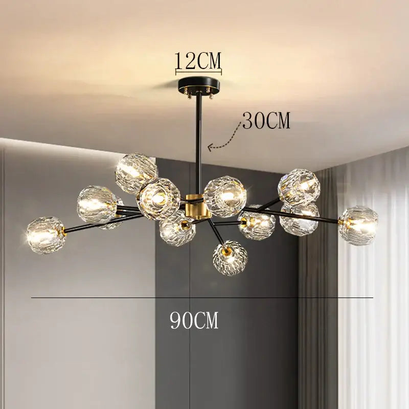 Modern chandelier with black metal arms, gold accents, and clear crystal globe bulbs by DecorBites crystal chandelier
