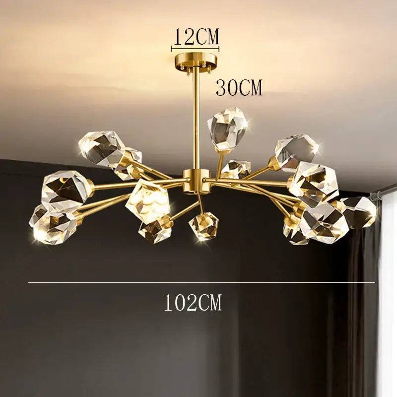 Gold-toned decorbites crystal chandelier with multiple faceted crystal pendants for luxury living room lighting