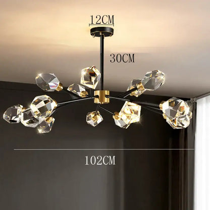 A decorbites crystal chandelier with black metal frame gold accents and faceted crystal spheres for luxury living rooms