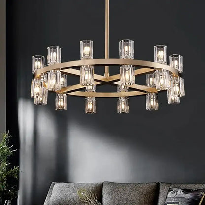Gold-toned decorbites crystal chandelier with clear glass candle-style bulbs in a circular modern design for luxury living room