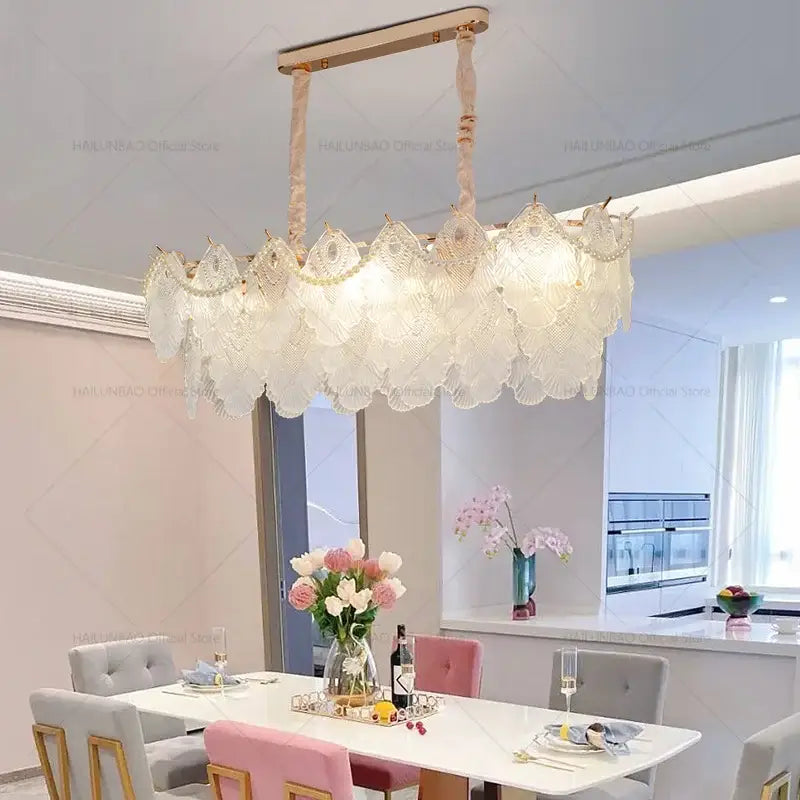 DecorBites crystal chandelier with translucent white glass leaves and gold metal accents for elegant living room decor