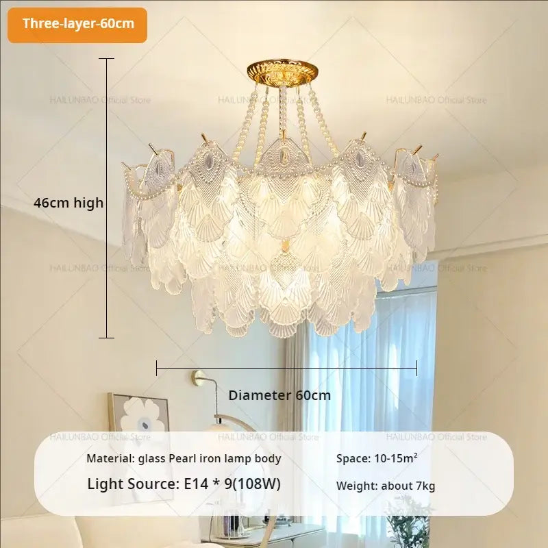 Elegant three-layer decorbites crystal chandelier with translucent glass pearl-like shells and gold-toned iron frame for luxury living room lighting