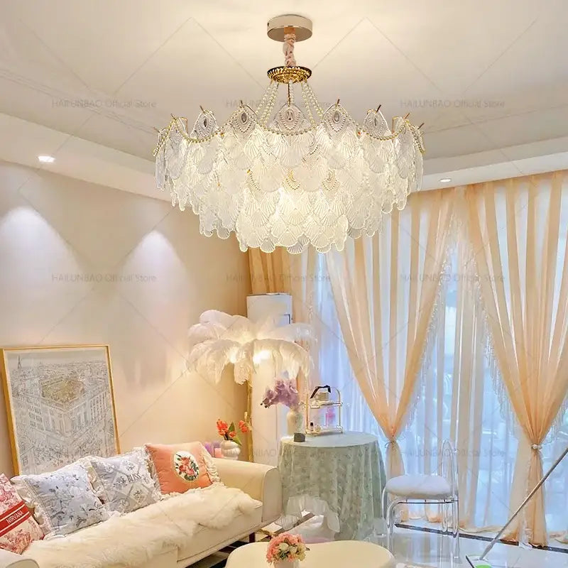 Elegant white crystal chandelier with gold-toned accents and scalloped fan design by DecorBites crystal chandelier for luxury decor