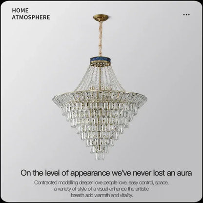 DecorBites crystal chandelier featuring multi-tiered clear glass prisms with gold-toned frame for luxury living room lighting