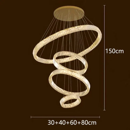 A modern decorbites crystal chandelier with interlocking rings and warm golden crystal lighting for luxury living rooms