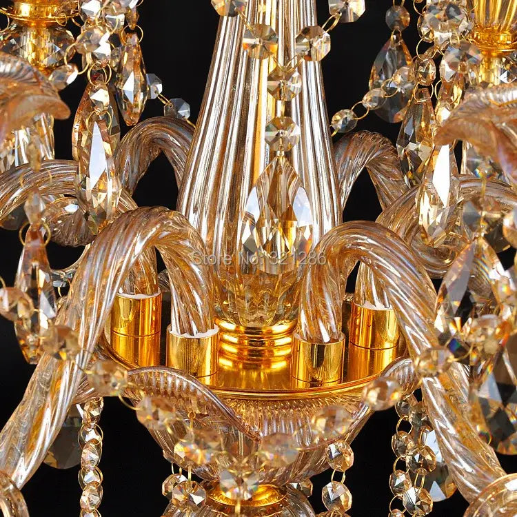 Golden decorbites crystal chandelier with intricate faceted glass arms and hanging beads for luxury indoor lighting