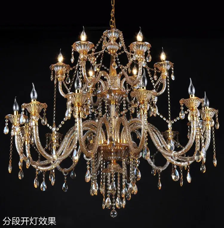 Gold-toned decorbites crystal chandelier with intricate glass arms and dangling teardrop crystals for luxury indoor lighting