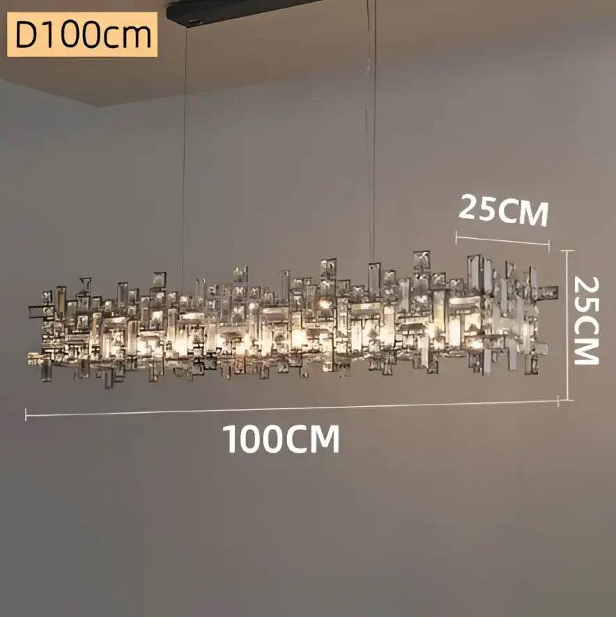 Decorbites crystal chandelier 100cm long with sleek metallic frame and clear glass prisms in modern cityscape design