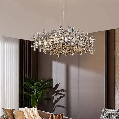 A modern rectangular decorbites crystal chandelier with clear faceted crystals in a layered geometric design for luxury lighting
