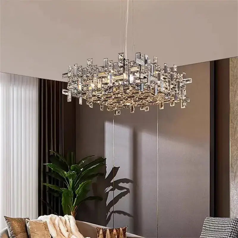 A modern rectangular decorbites crystal chandelier with clear faceted crystals in a layered geometric design for luxury lighting