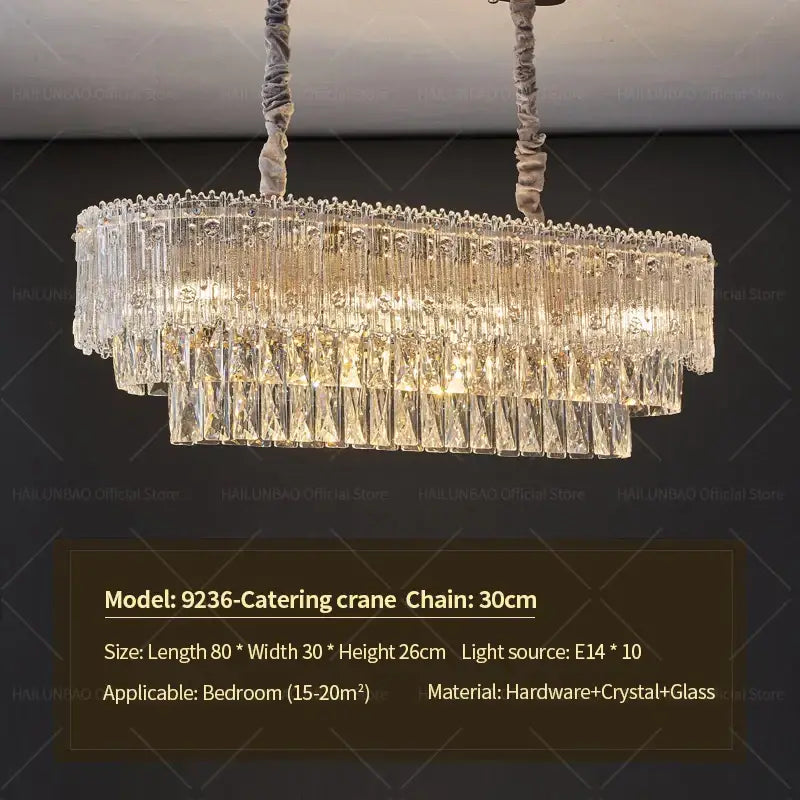 Elegant oval-shaped decorbites crystal chandelier with tiered glass prisms and metallic frame for luxury modern lighting