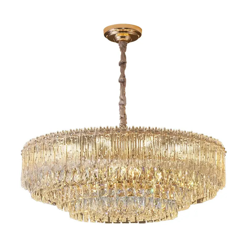 Golden-toned decorbites crystal chandelier with cascading clear faceted crystal prisms for luxury modern room lighting