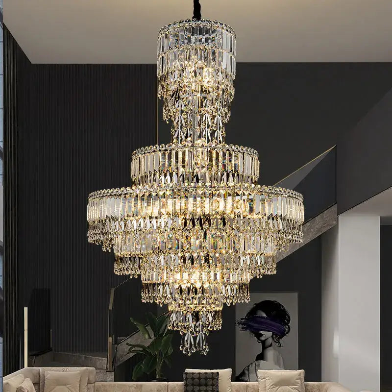 Decorbites crystal chandelier with multi-tiered clear faceted crystals and gold accents for luxury living spaces