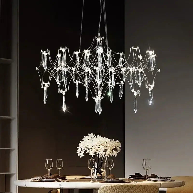 Decorbites crystal chandelier with multi-armed wireframe design and teardrop crystals for luxury modern interiors