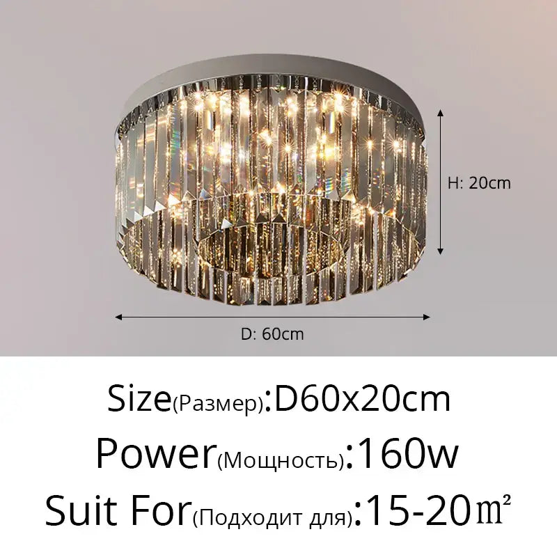 A modern decorbites crystal chandelier with sleek chrome finish and cascading clear crystal prisms illuminated warmly