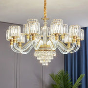Elegant gold-toned decorbites crystal chandelier with cascading glass prisms for luxury living room and bedroom lighting