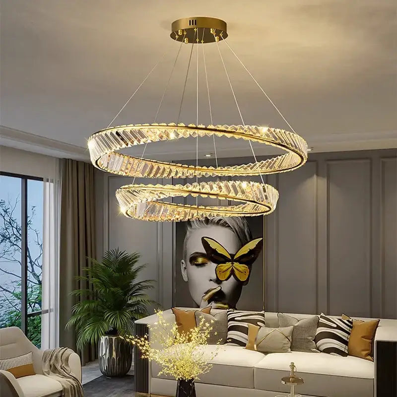 Golden double-ring decorbites crystal chandelier with faceted crystal accents for living room and bedroom lighting