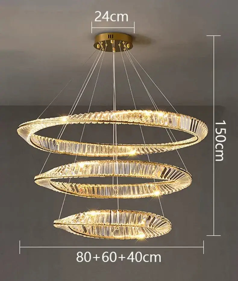 A modern three-tiered decorbites crystal chandelier with gold-toned metal frames and cascading crystal accents for living rooms and bedrooms