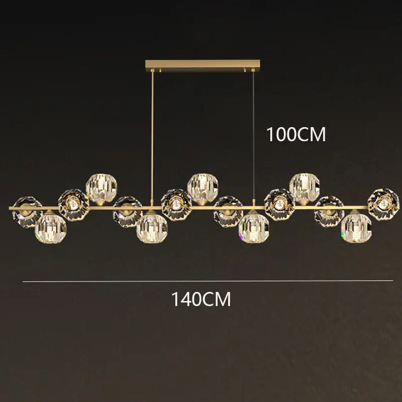 Gold-toned decorbites crystal chandelier with faceted crystal spheres suspended on a bar for living and dining rooms