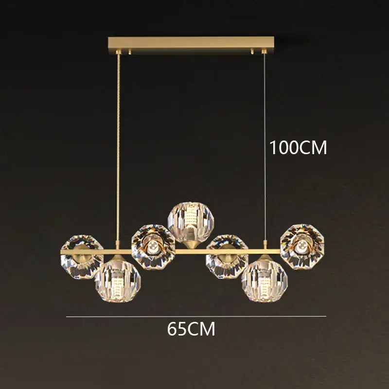 Gold-toned decorbites crystal chandelier with six faceted crystal spheres for living and dining room lighting