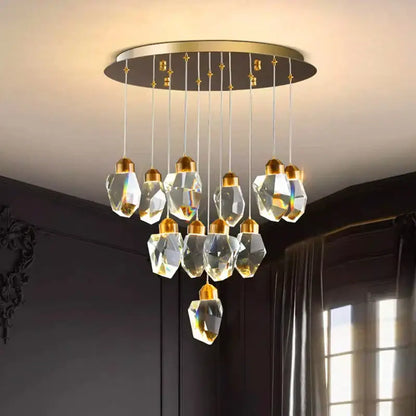 Modern decorbites crystal chandelier with gold ceiling mount and clear glass pendant lights for living and dining room