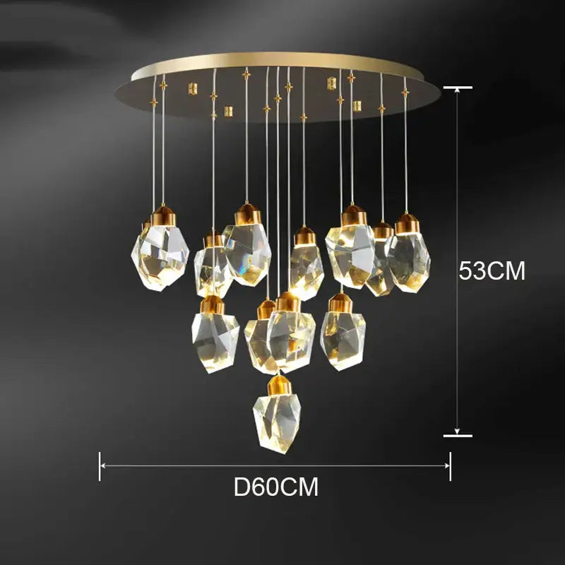 A decorbites crystal chandelier with gold ceiling mount and clear glass pendant light for living and dining rooms