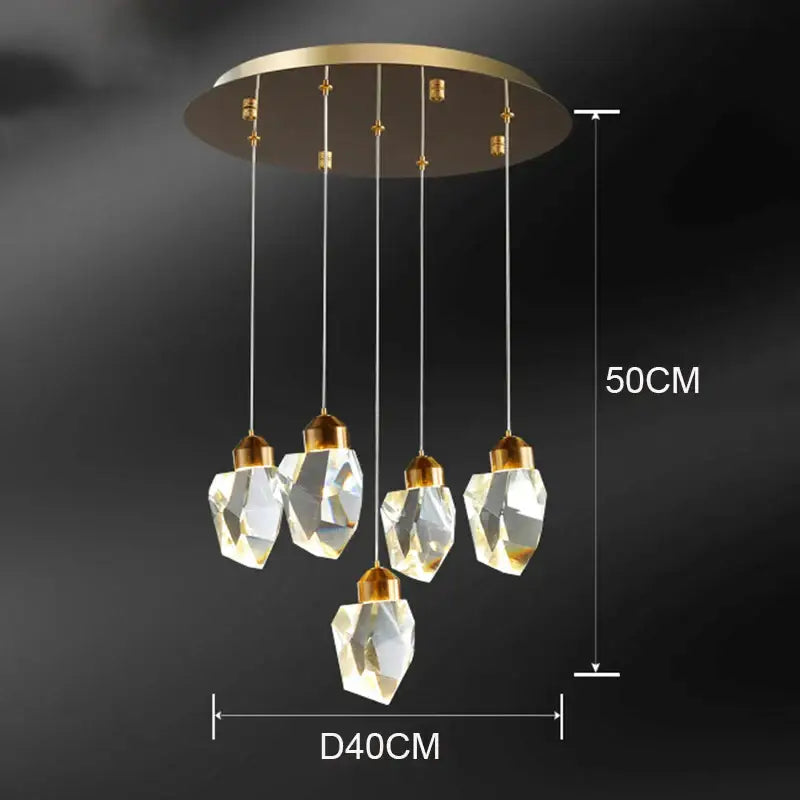 A modern decorbites crystal chandelier with five clear glass pendants and gold-toned ceiling mount for living room
