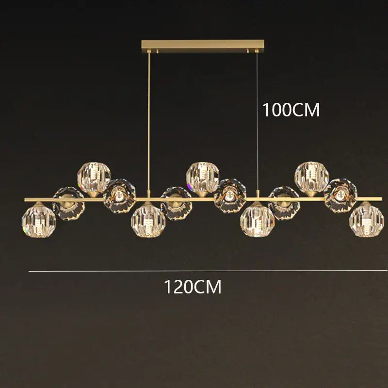 Gold-toned modern decorbites crystal chandelier featuring faceted crystal spheres for living and dining room lighting